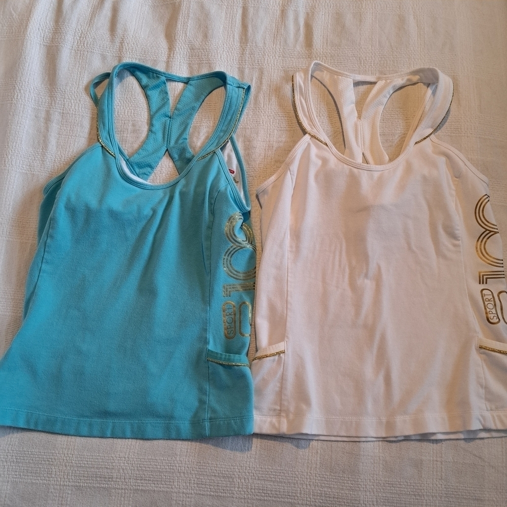 Fila 100 women's size Medium tank top lot of 2, 1 white, 1 light blue